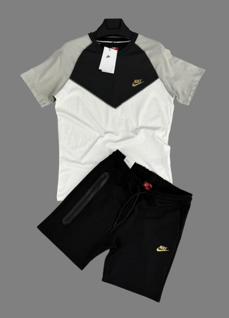 Set Nike Tech Fleece pentru bărbați, tricou ecru, gri și negru și pantaloni scurți negri. Calitate premium.