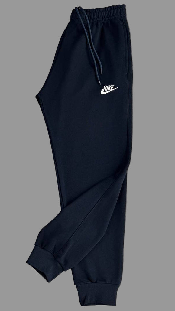 Pantaloni de trening Nike pentru bărbați, albastru închis cu emblemă albă